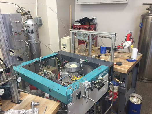 Gas source mass spectrometer with custom cup configuration for chlorine isotopes at UNM
